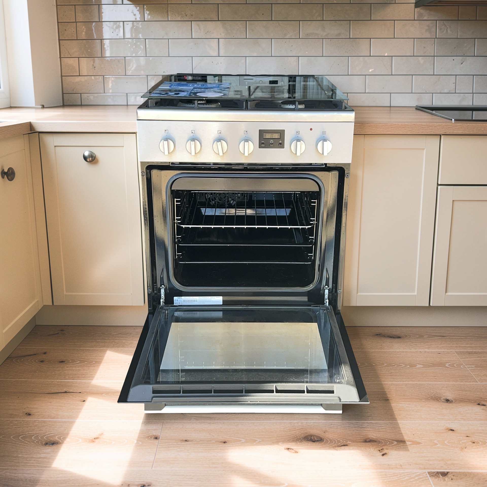 Gasfornuis AEG RVS-BLACK met Heteluchtoven CKB64412BM €299,- - Image 3